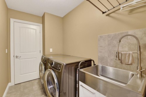 2 Ranchers Green, Okotoks, AB - Indoor Photo Showing Laundry Room