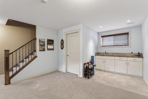 2 Ranchers Green, Okotoks, AB - Indoor Photo Showing Other Room