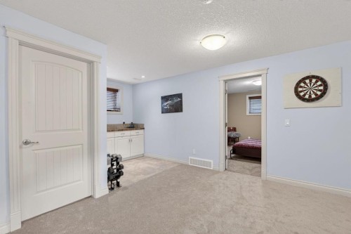 2 Ranchers Green, Okotoks, AB - Indoor Photo Showing Other Room