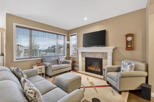 2 Ranchers Green, Okotoks, AB - Indoor Photo Showing Living Room With Fireplace