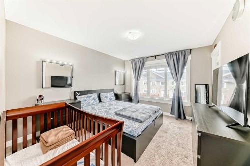 176 Cascades Passage, Chestermere, AB - Indoor Photo Showing Bedroom