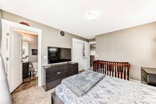 176 Cascades Passage, Chestermere, AB - Indoor Photo Showing Bedroom