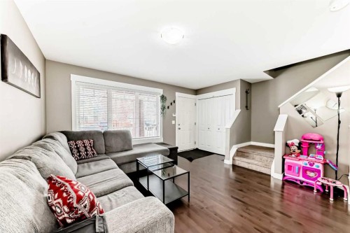 176 Cascades Passage, Chestermere, AB - Indoor Photo Showing Living Room