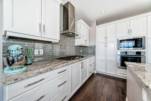 8 Masters Court Se, Calgary, AB - Indoor Photo Showing Kitchen With Upgraded Kitchen