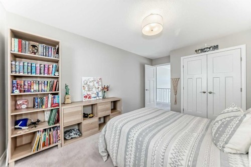 8 Masters Court Se, Calgary, AB - Indoor Photo Showing Bedroom