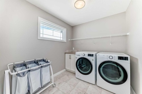 8 Masters Court Se, Calgary, AB - Indoor Photo Showing Laundry Room