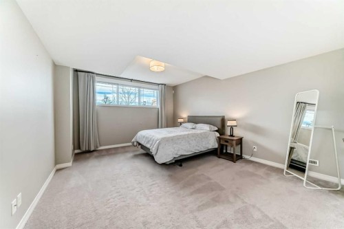 8 Masters Court Se, Calgary, AB - Indoor Photo Showing Bedroom