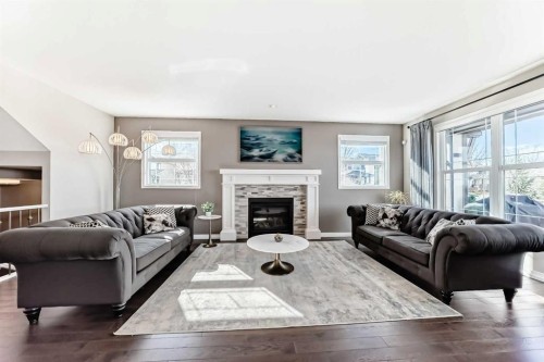 8 Masters Court Se, Calgary, AB - Indoor Photo Showing Living Room With Fireplace