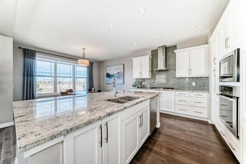 8 Masters Court Se, Calgary, AB - Indoor Photo Showing Kitchen With Double Sink With Upgraded Kitchen