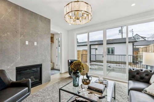 1529 29 Avenue Sw, Calgary, AB - Indoor Photo Showing Living Room With Fireplace