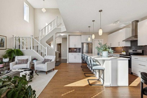 36 Sunrise Crescent, Cochrane, AB - Indoor Photo Showing Kitchen With Stainless Steel Kitchen With Upgraded Kitchen