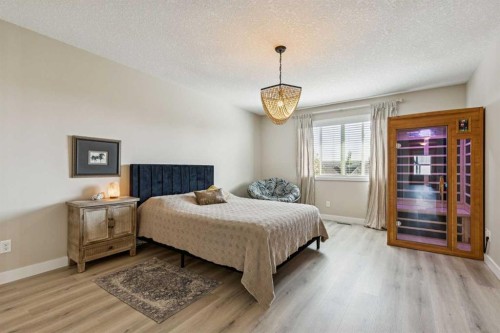 36 Sunrise Crescent, Cochrane, AB - Indoor Photo Showing Bedroom