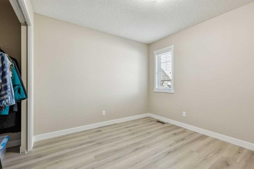 36 Sunrise Crescent, Cochrane, AB - Indoor Photo Showing Other Room