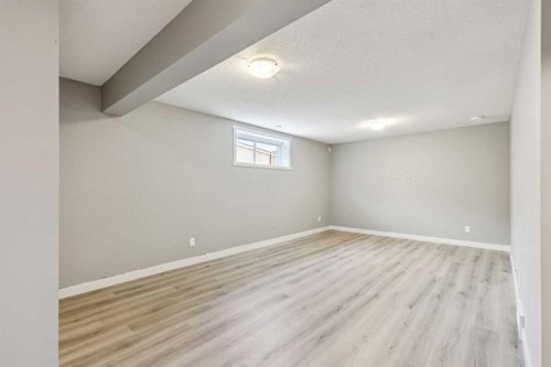 36 Sunrise Crescent, Cochrane, AB - Indoor Photo Showing Other Room
