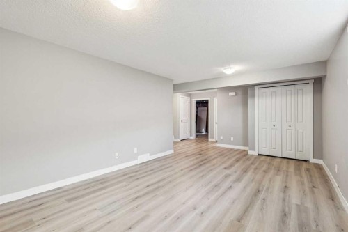 36 Sunrise Crescent, Cochrane, AB - Indoor Photo Showing Other Room
