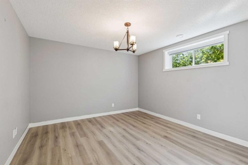36 Sunrise Crescent, Cochrane, AB - Indoor Photo Showing Other Room