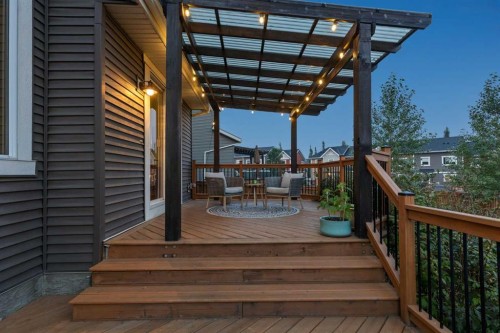 36 Sunrise Crescent, Cochrane, AB - Outdoor With Deck Patio Veranda With Exterior