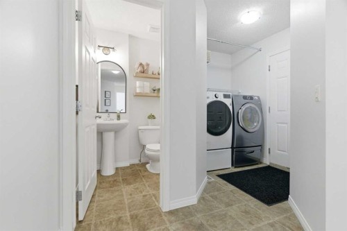 107 Cimarron Grove Circle, Okotoks, AB - Indoor Photo Showing Laundry Room