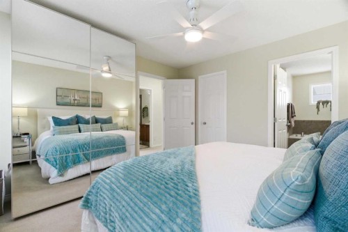 107 Cimarron Grove Circle, Okotoks, AB - Indoor Photo Showing Bedroom