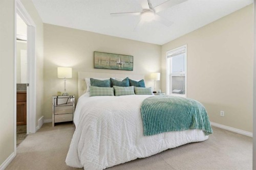 107 Cimarron Grove Circle, Okotoks, AB - Indoor Photo Showing Bedroom