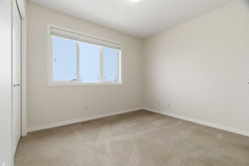 107 Cimarron Grove Circle, Okotoks, AB - Indoor Photo Showing Other Room