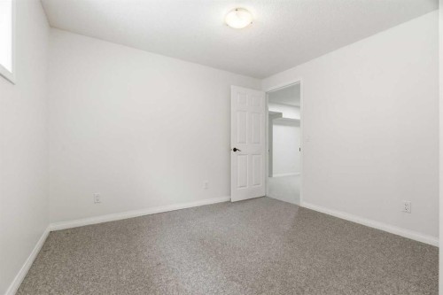 107 Cimarron Grove Circle, Okotoks, AB - Indoor Photo Showing Other Room