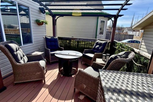107 Cimarron Grove Circle, Okotoks, AB - Outdoor With Deck Patio Veranda With Exterior