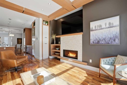2027 42 Avenue Sw, Calgary, AB - Indoor Photo Showing Living Room With Fireplace