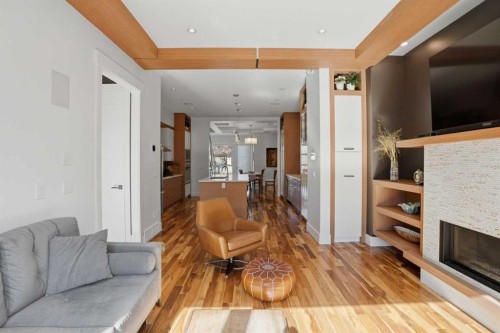 2027 42 Avenue Sw, Calgary, AB - Indoor Photo Showing Living Room With Fireplace