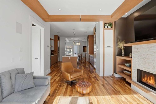 2027 42 Avenue Sw, Calgary, AB - Indoor Photo Showing Living Room With Fireplace