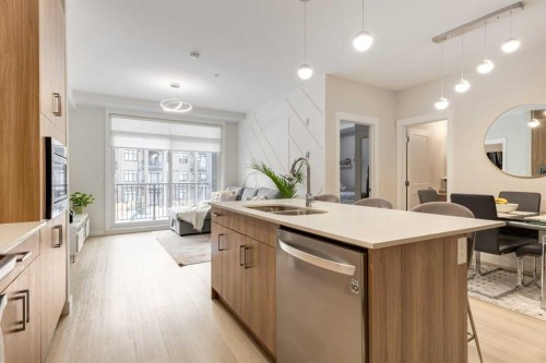 3205-200 Seton Circle Se, Calgary, AB - Indoor Photo Showing Kitchen With Double Sink With Upgraded Kitchen