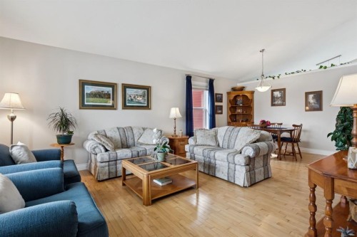 657 Woodside Court Nw, Airdrie, AB - Indoor Photo Showing Living Room