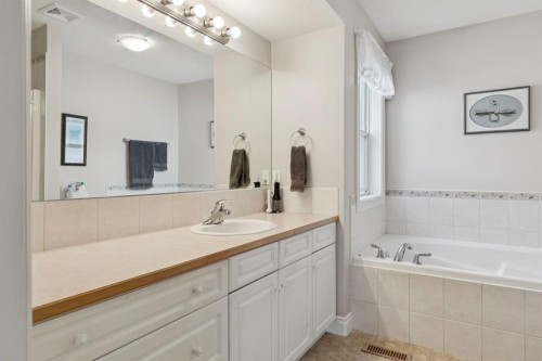 657 Woodside Court Nw, Airdrie, AB - Indoor Photo Showing Bathroom