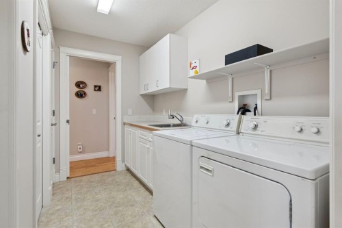 657 Woodside Court Nw, Airdrie, AB - Indoor Photo Showing Laundry Room