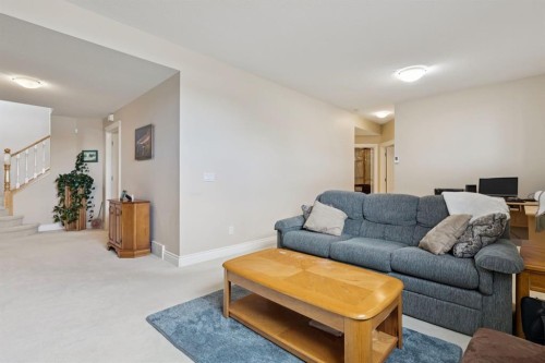 657 Woodside Court Nw, Airdrie, AB - Indoor Photo Showing Living Room