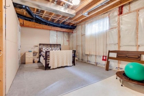 657 Woodside Court Nw, Airdrie, AB - Indoor Photo Showing Basement