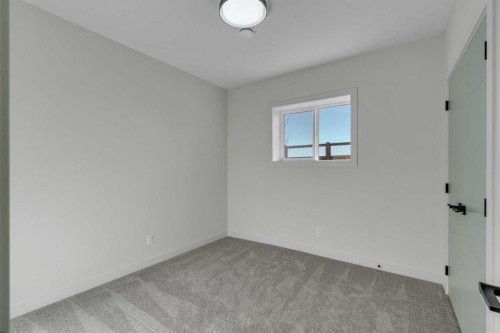 341 Limestone Bay, Balzac, AB - Indoor Photo Showing Other Room