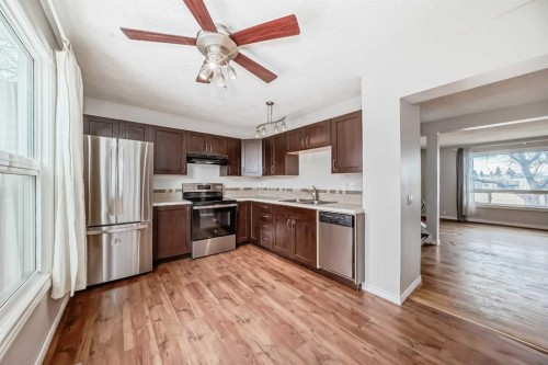 24 Abergale Way Ne, Calgary, AB - Indoor Photo Showing Kitchen With Double Sink