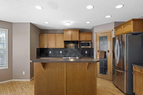 19 Sienna Park Crescent Sw, Calgary, AB - Indoor Photo Showing Kitchen