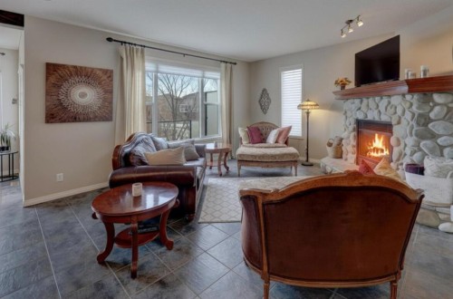 110 Royal Oak View Nw, Calgary, AB - Indoor Photo Showing Living Room With Fireplace