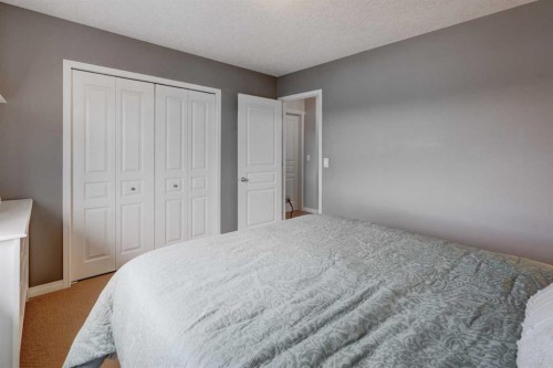 110 Royal Oak View Nw, Calgary, AB - Indoor Photo Showing Bedroom