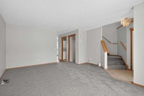 317 Martindale Drive Ne, Calgary, AB - Indoor Photo Showing Other Room