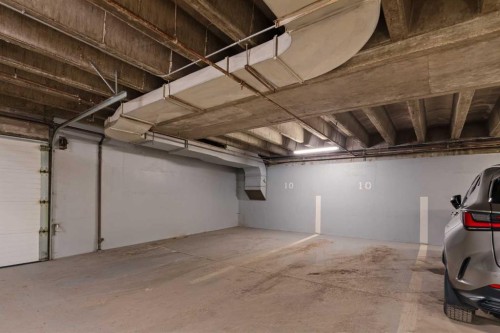 3S-222 Eagle Ridge Drive Sw, Calgary, AB - Indoor Photo Showing Garage