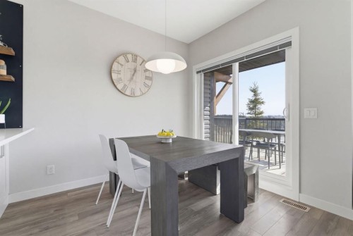 1208 Jumping Pound Common, Cochrane, AB - Indoor Photo Showing Dining Room