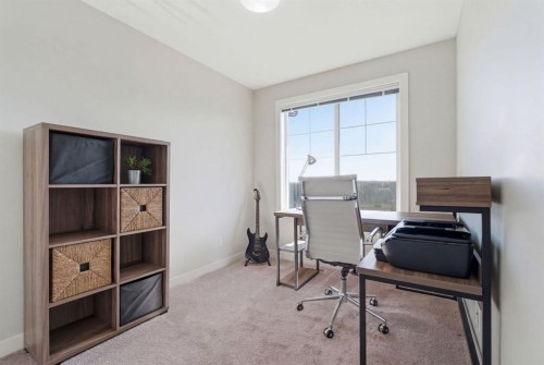 1208 Jumping Pound Common, Cochrane, AB - Indoor Photo Showing Office
