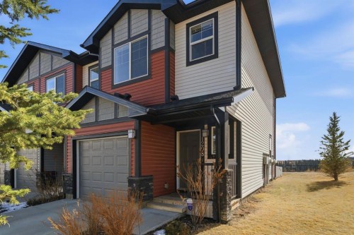 1208 Jumping Pound Common, Cochrane, AB - Outdoor With Exterior