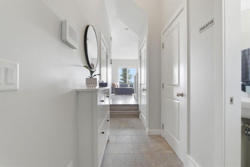 1208 Jumping Pound Common, Cochrane, AB - Indoor Photo Showing Other Room