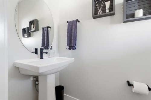 1208 Jumping Pound Common, Cochrane, AB - Indoor Photo Showing Bathroom