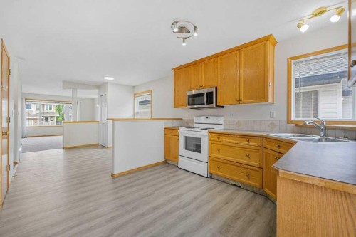 22 Lanterman Close, Red Deer, AB - Indoor Photo Showing Kitchen With Double Sink
