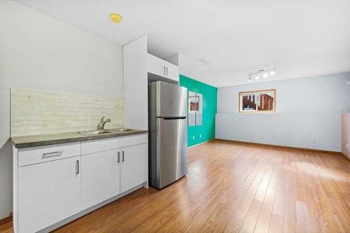 22 Lanterman Close, Red Deer, AB - Indoor Photo Showing Kitchen With Double Sink